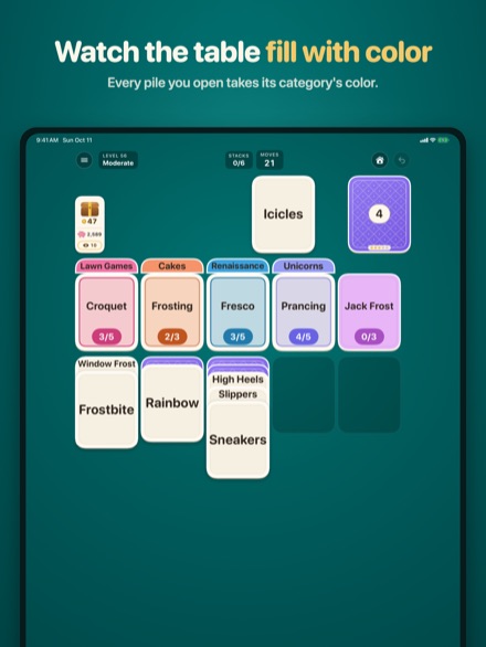 Follow Suit on iPad: a mid-game table where each opened pile has taken on its own color.